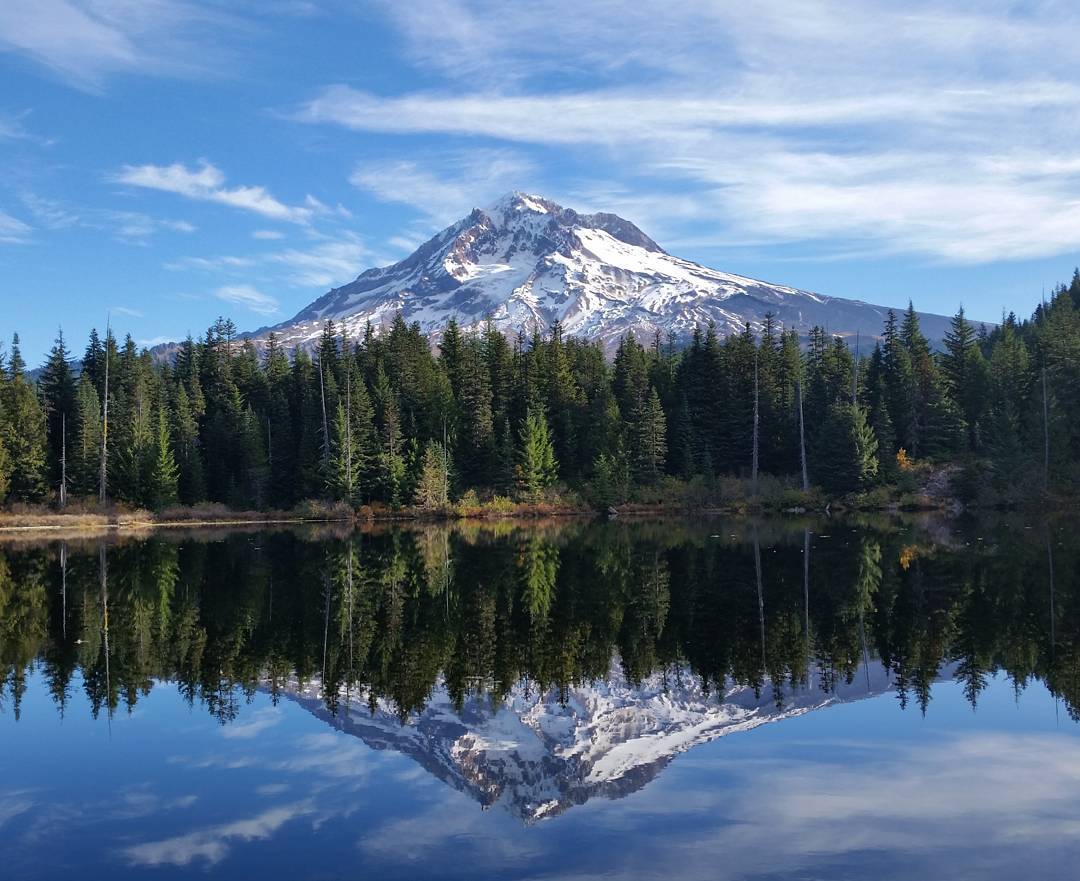 A reflection of Mount Hood on Burnt Lake.