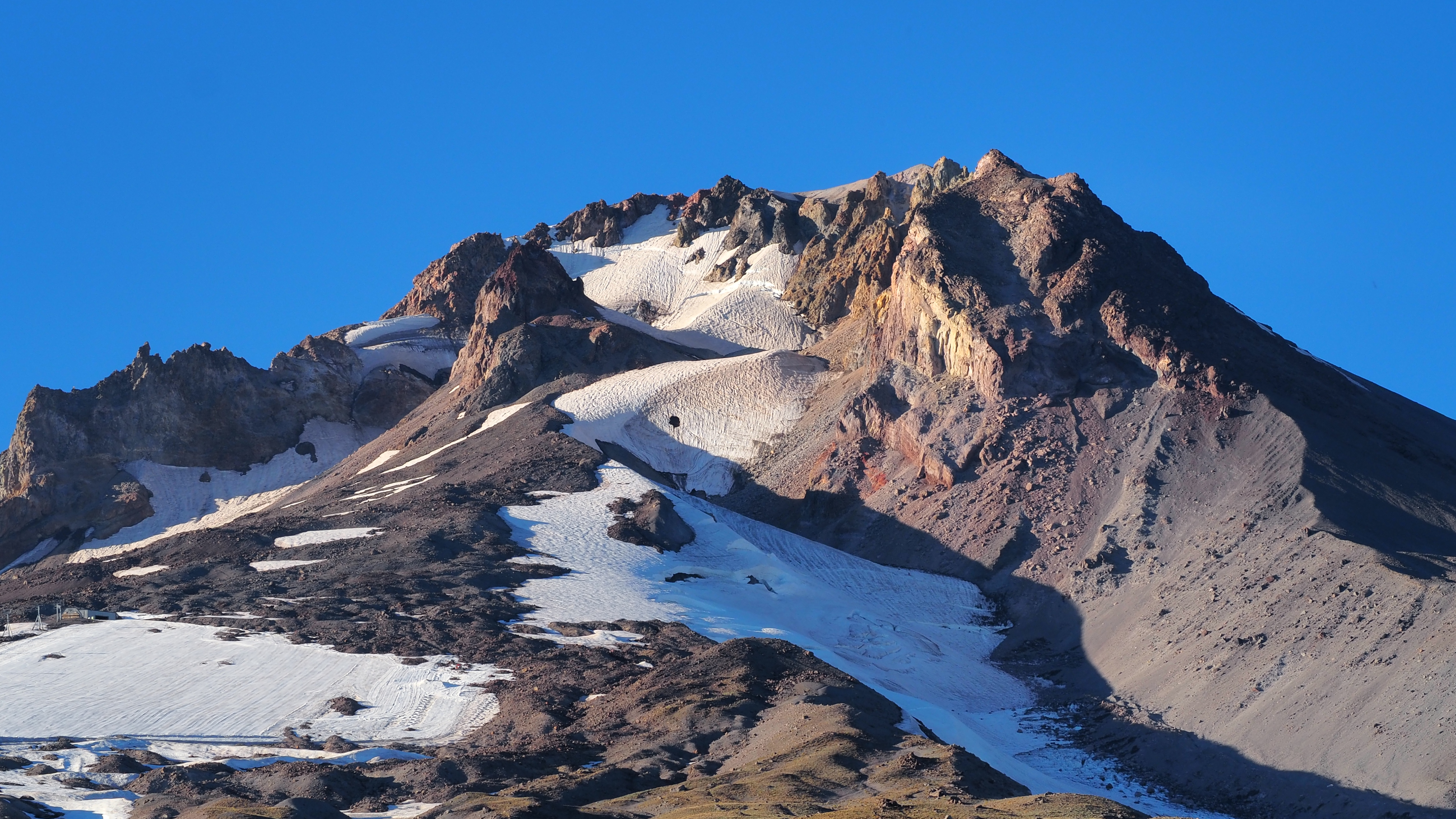 Mount Hood's summit during basking in the remaining sunlight.