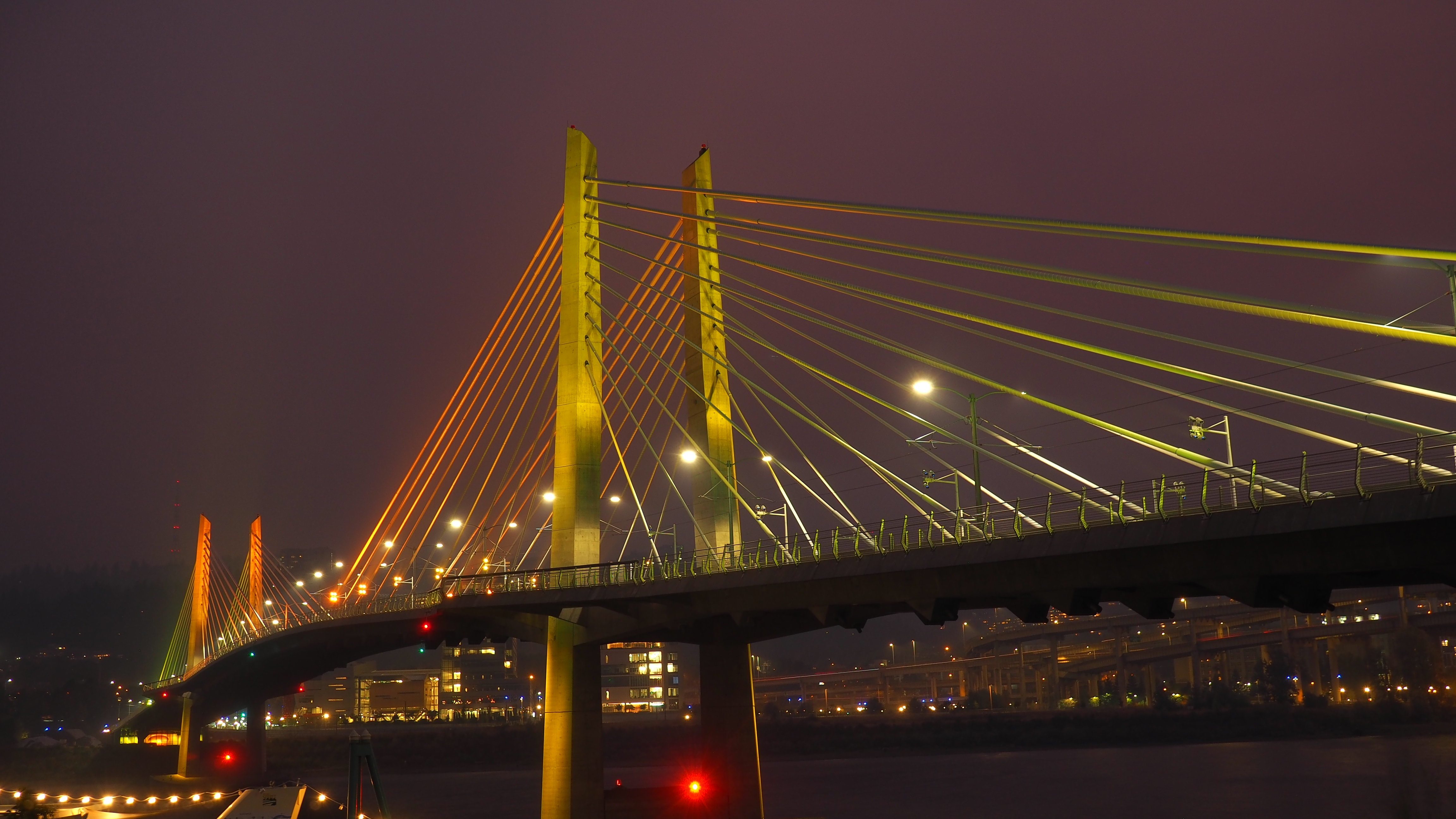 Tilikum Crossing Bridge in a deeply smokey night.